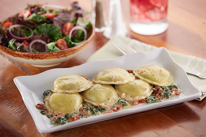 Celentano Four Cheese Ravioli and Pesto Cream Sauce with Sun Dried Tomatoes, Baby Spinach