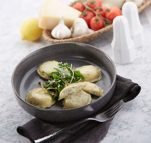 Celentano Four Cheese Ravioli with Pesto Cream Sauce and Shaved Celery Salad