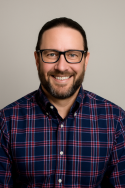 headshot of man in flannel